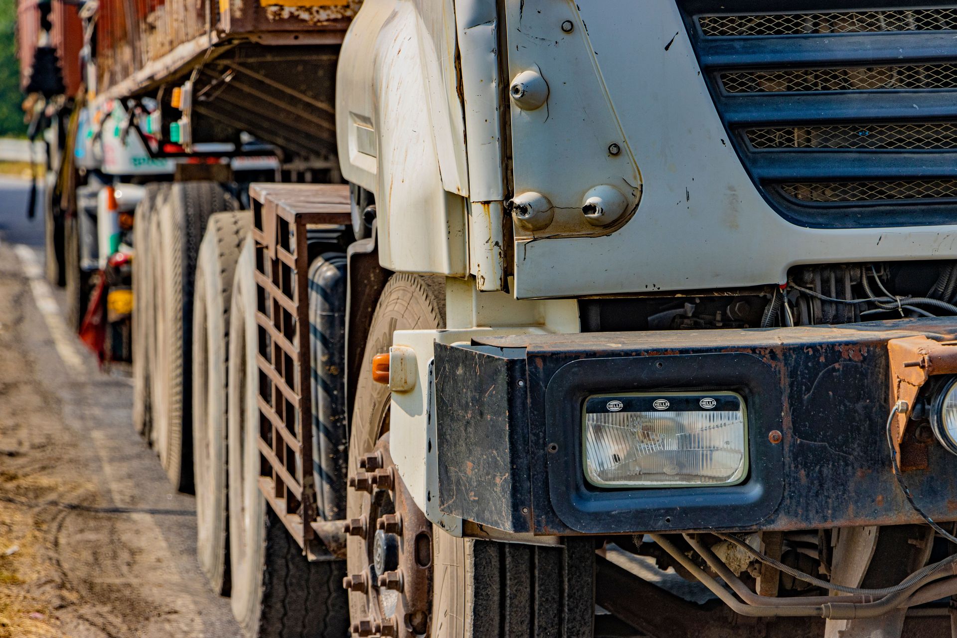 Detailed view of a large truck on an Indian road highlighting transportation and logistics.
